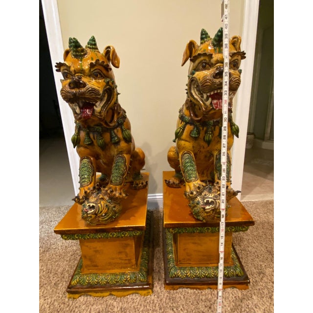 Chinese 20th Century Large Pair of Chinese Guardian Lion “Foo Dogs” With Decorative Pedestal Base For Sale - Image 3 of 4