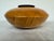 Design Plus Gallery presents a Shaped Vessel by Todd Lewis. The bowl is smooth as silk and made with two types of wood;...