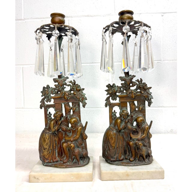 Up for sale is a wonderful pair of antique ornate gilded bronze girandole candle holders. They are cast out of thick gold...