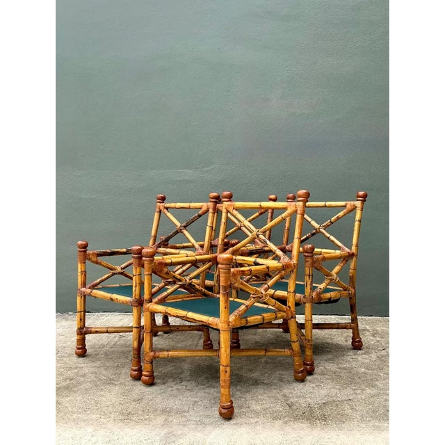 This exquisite set of four vintage dining chairs features a distinctive X-back design that evokes the refined character of...