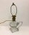 Precious antique electrified oil lamp from the early 20th century. The pressed glass lamp has a Greek key pattern and...