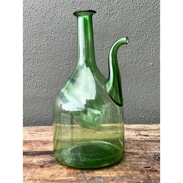 This exquisite vintage Italian wine decanter is a sophisticated example of Mid-Century Modern glassware, combining...