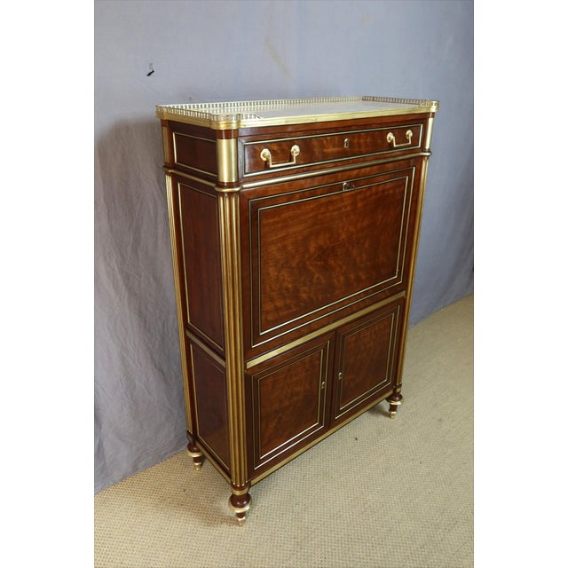A rare louis xvi period secretary desk in mahogany with ebony stringing. This exceptionally well-crafted piece (entirely...