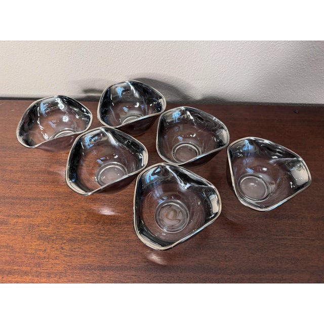 Lovely set of 6 mid-century, silver rimmed, very sought after, Dorothy Thorpe nut or chip bowls. There are also 6 matching...