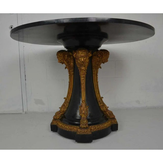 Early 20th-century barque Revival-style wood carved base with pietra-dura top colorful inlaid stones depicting flying but...