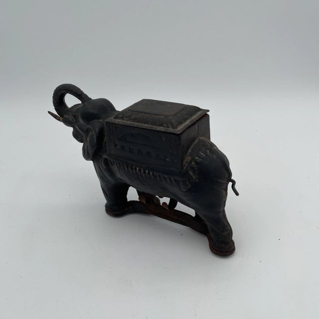 Antique Art Deco heavy cast iron elephant cigarettes holder and dispenser. This is a nicely detailed heavy piece and in...