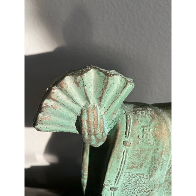 An expressive vintage Durastone sculpture depicting a traditional Japanese Noh or ceremonial court dancer captured mid-...