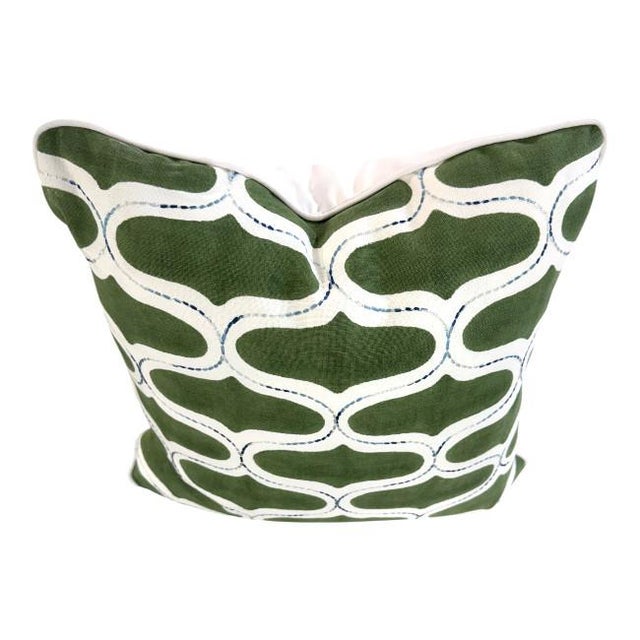 Elevate your home décor with this elegant throw pillow featuring a striking green and white geometric pattern. The rich...