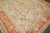 A late 19th century Turkish Oushak in predominant ivories and orange. Measures: 10'7" x 13'3" Oushak carpets are Turkish...