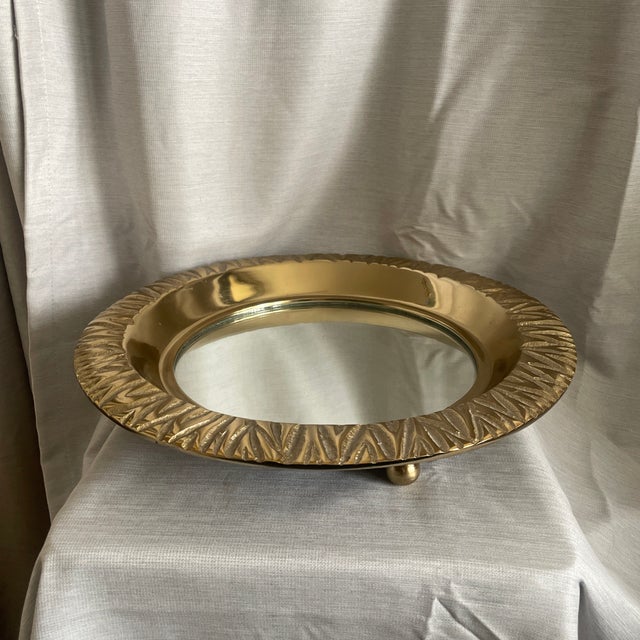 Heavy brass and mirror tray. Display a candle or use as a catchall.