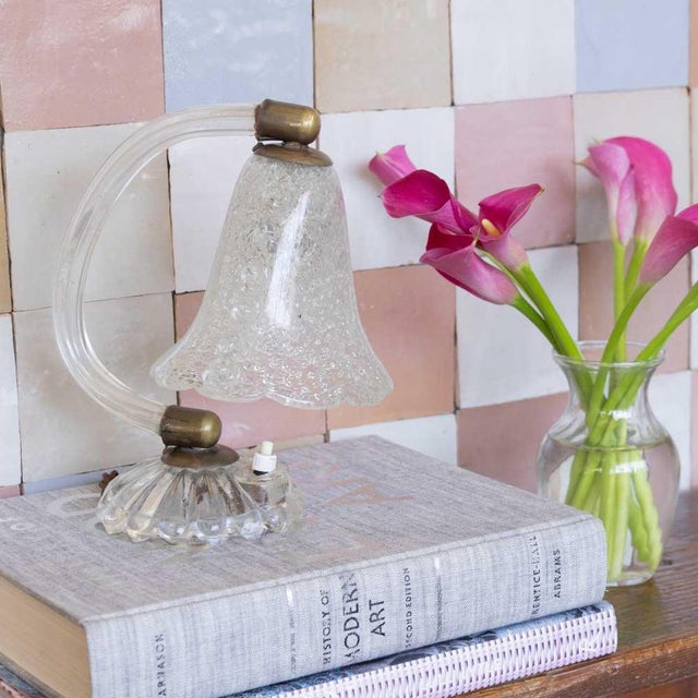 Petite Murano glass lamp from Italy, 1940s. Upside down frosted glass bell shade with wavy sides hangs from a curved glass...