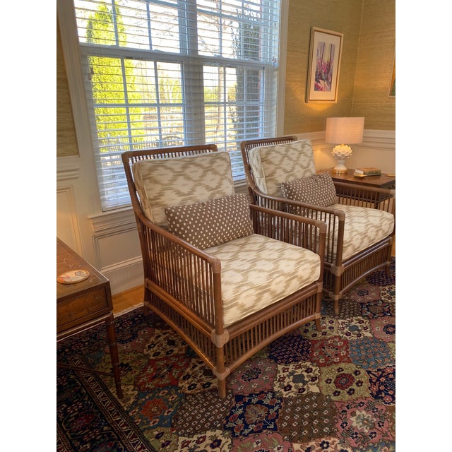 Pair of Taylor King Marlow Pencil Rattan chairs with custom Schumacher Santa Monica Ikat neutral fabric (176500). Chairs...