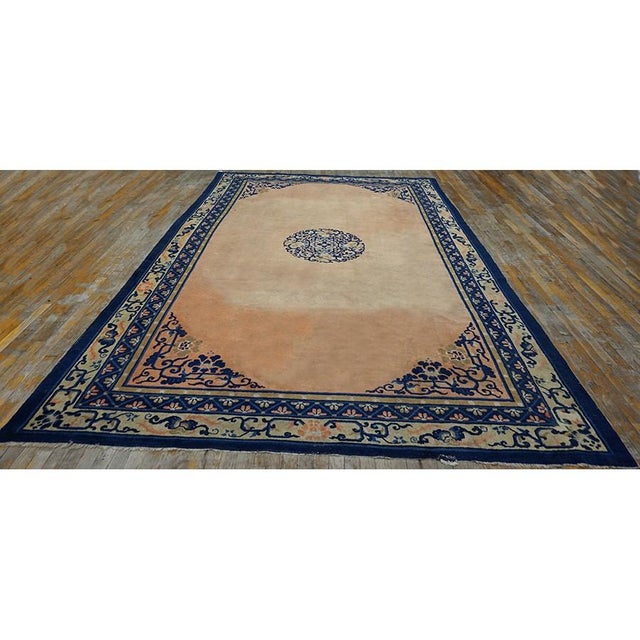 Floral Medallion 1920s Hand Knotted Pile Coral / Salmon Pink Wool Rectangle Antique Rug, Circa Date: 1920s. This...