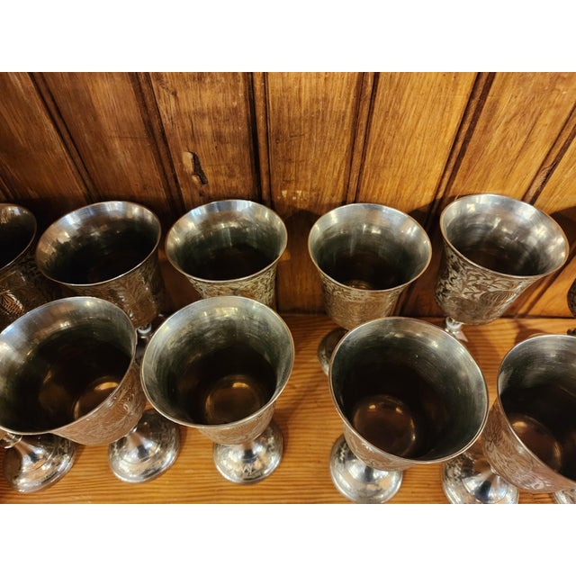 Large set of World Gift goblets from India. 6.25 inches tall with a nice "ting" when toasting. As always, your Home...