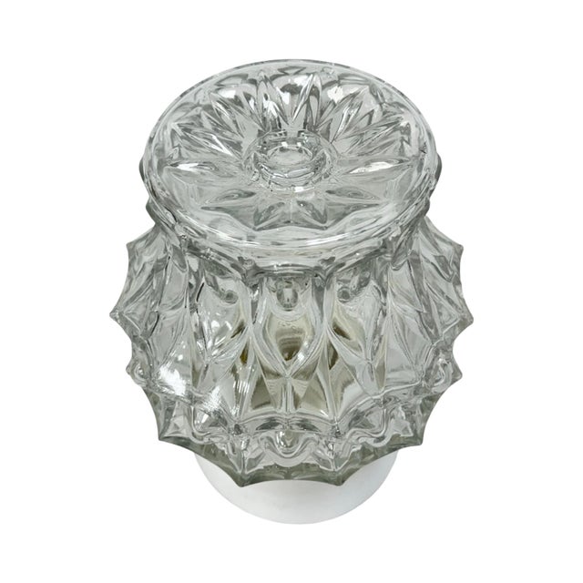 This lamp combines an original, historic Czechoslovakian lampshade with a new, contemporary base/wiring. The lampshade was...