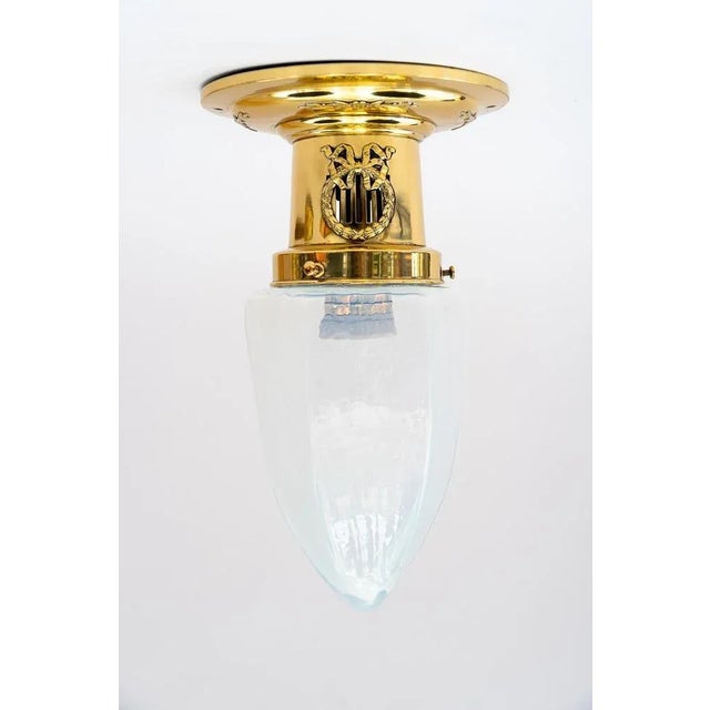 Two Art Deco ceiling lamps with opaline glass shades vienna around 1920s Brass polished and stove enameled. European Plug...
