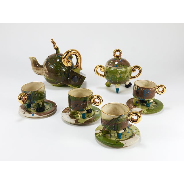 A striking, surreal-inspired postmodern pottery tea or coffee set from the early 1990s, designed by Juraj Mahalik (Poland)...