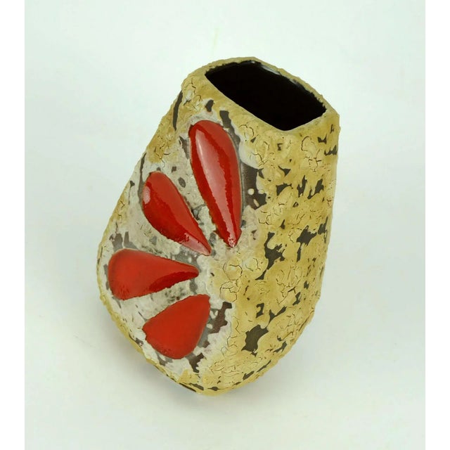 West German ceramic vase with unusual glaze in various shades of beige on dark brown combined with bright red leaf...
