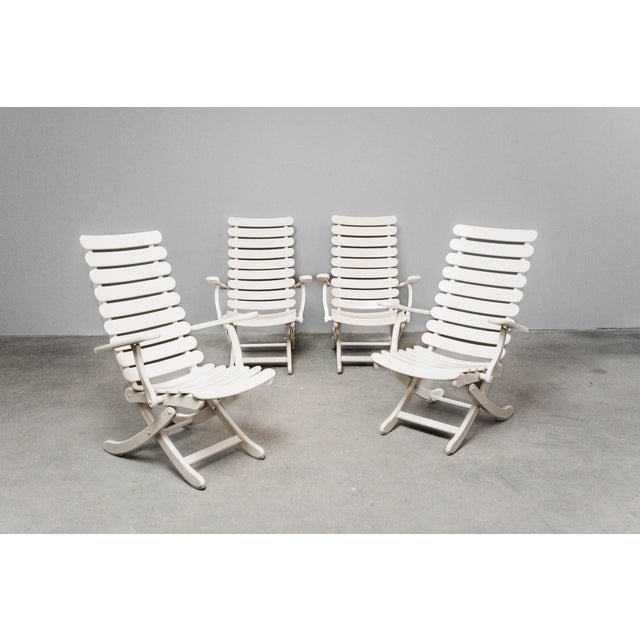 Item: Set of 4 garden chairs Era & Style: Vintage - Design - 1980s Features: - Stylish and comfortable furniture with...