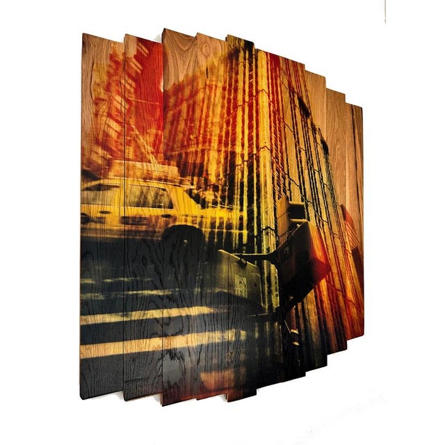 Part of the “wooden postcards” series by husband and wife team hugo garcia-urrutia & mk semos, "rays of city light" is...