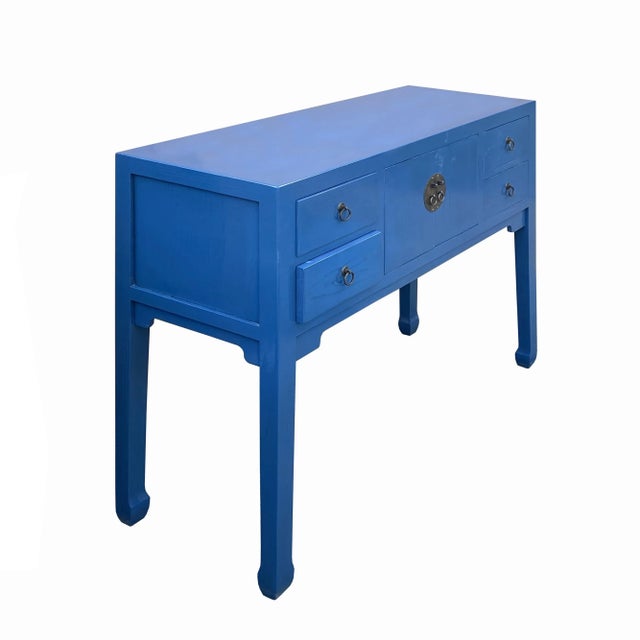 This is a simple oriental bright blue lacquer round moon face hardware console side table with a straight-leg design....