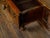 A Spanish walnut console table from the 18th century with two carved drawers, turned baluster legs and H-Form cross...