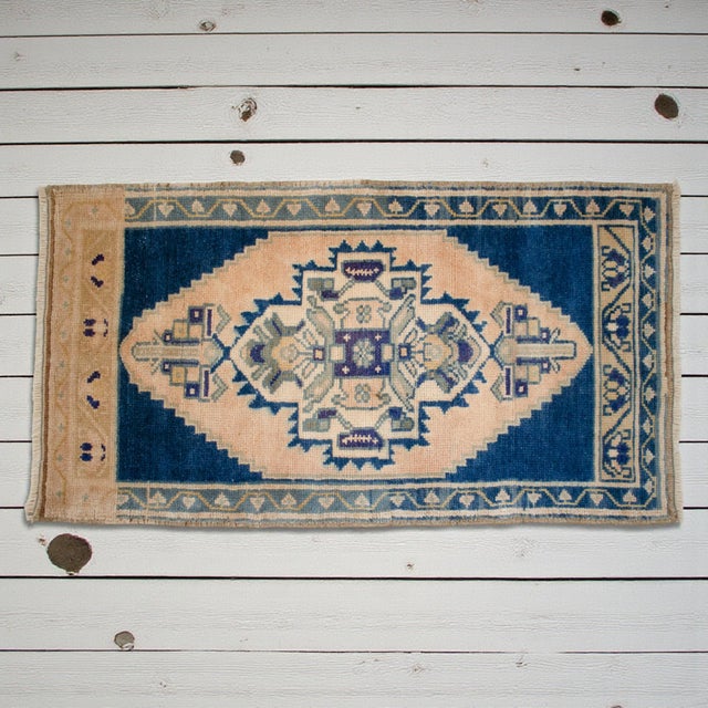 Vintage Turkish Hand-Knotted Small Rug / Mat from Oushak, 1970, featuring warm apricot-sand tones and authentic village...