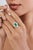 This Regal Halo Cocktail Ring features 3.31 carat natural Zambian emerald, set in 18k white gold. The center stone...