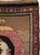 This mid-20th-century Turkish Anatolian long gallery carpet presents four large, vertically aligned medallions across a...
