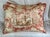 Custom chinoiserie-style patterned pillows are absolutely captiviating. The scene includes a group of people engaged in...