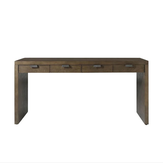 A Modern Desk with a contemporary design and unique personality. Its metal pulls in an Ember finish and figured cathedral...