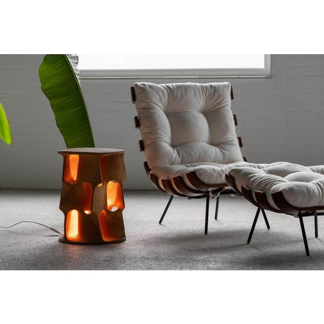 Rare early version Flamme floor lamp by Guy Bareff, manufactured in France in the 1970s. This exceptional terracotta lamp...
