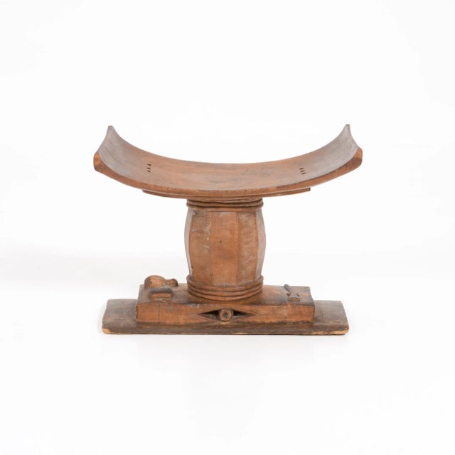 This Nigerian Ashanti stool can be dated in the early 20th century. In traditional Ashanti culture, stools indicated...