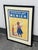 Design Plus Gallery presents a Framed Chocolat Menier Advertising Print after R.Bouisset’s Circa 1920 Poster. The 1996...