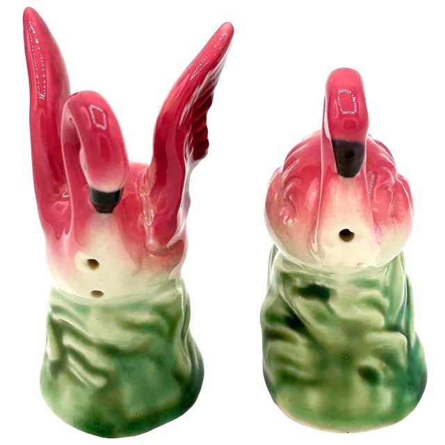 Mid-Century pink and green ceramic flamingo tabletop salt & pepper shaker set. The set features two beautifully detailed...