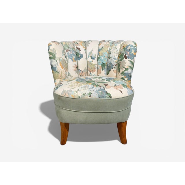 Swedish Mid-Century Modern, Lounge Chair, Floral Fabric, Beech, Sweden, 1950s A single slipper or lounge chair designed...