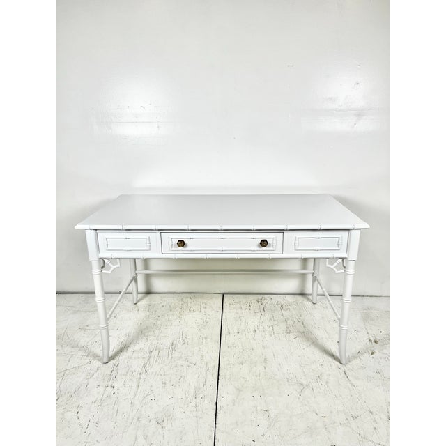 Newly lacquered faux bamboo writing desk. Made by Thomasville for the Allegro line. Large writing desk with one drawer....