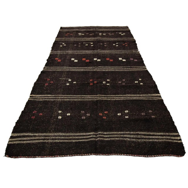 Vintage handwoven kilim rug from Afyon region of Turkey. Approximately 50-60 years old. In very good condition