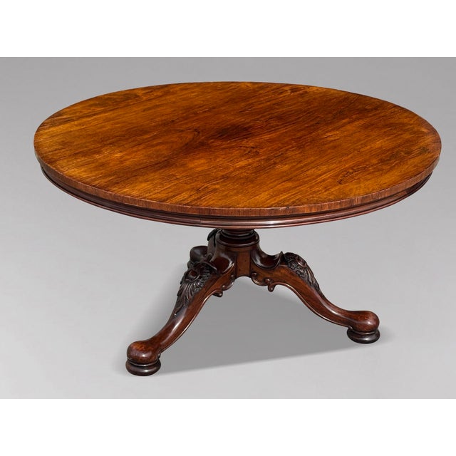 This William IV period early 19th-century large and handsome centre table or dining is crafted from well figured wood, and...