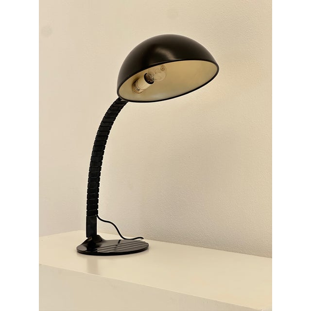 Adjustable Table Lamp by Elio Martinelli for Martinelli Luce, 1970s, in Very Good conditions. Designed 1970 to 1979 This...