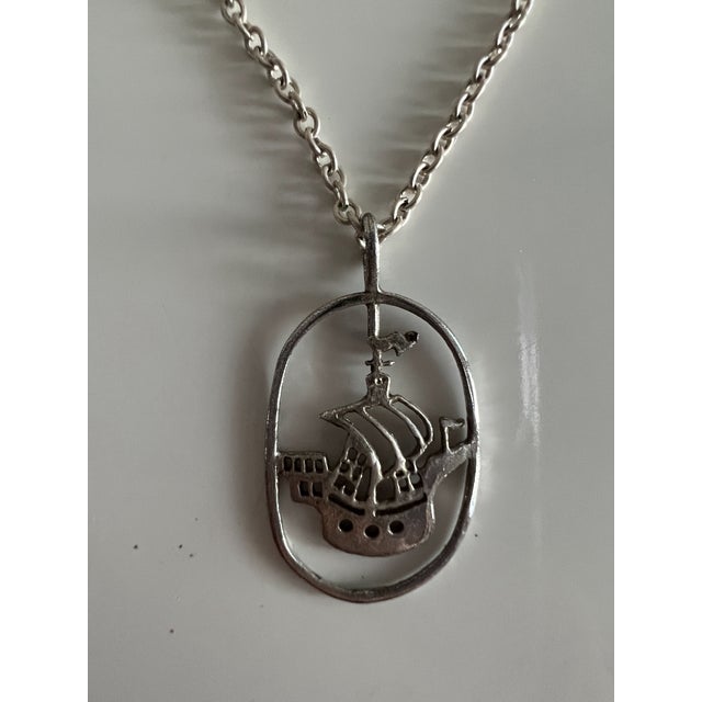 Contemporary Sterling Silver Necklace With a Multi-Masted Sailing Ship Pendant Inside an Open Oval Wire Frame For Sale - Image 3 of 6
