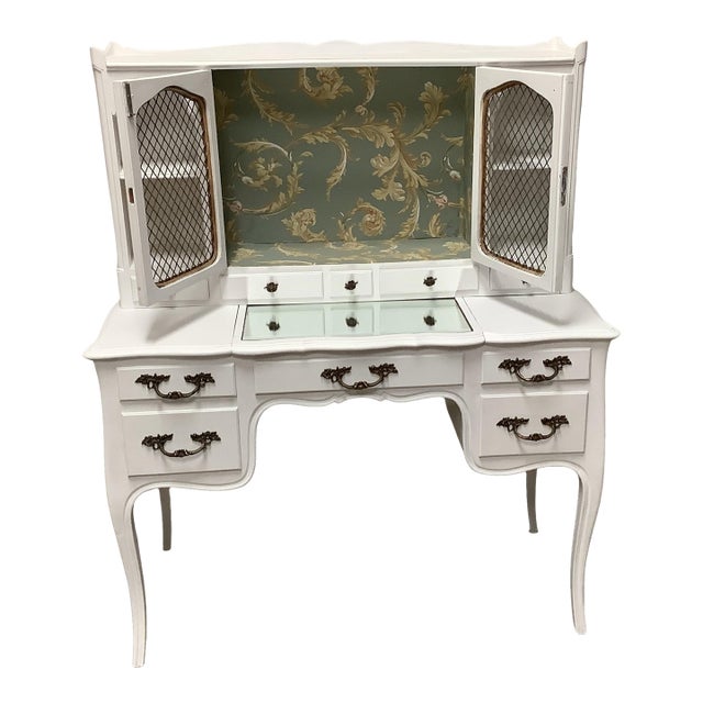 Vintage Vanity or Desk French Country Painted White Wire Doors Mirrored Top Multiple Drawers Wallpapered Interior Top For Sale