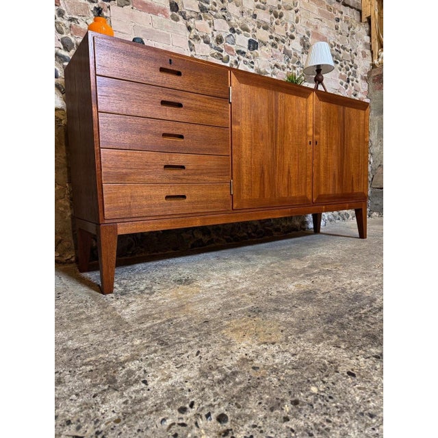 Rare Danish mid-century teak sideboard by Kai Winding. Rare to find in teak and to find one on original base (not plinth...