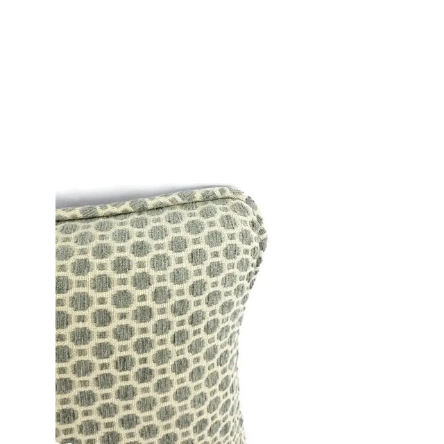 A misty aqua blue chenille on a white background in a mini geometric pattern pillow cover. This pillow is finished with...