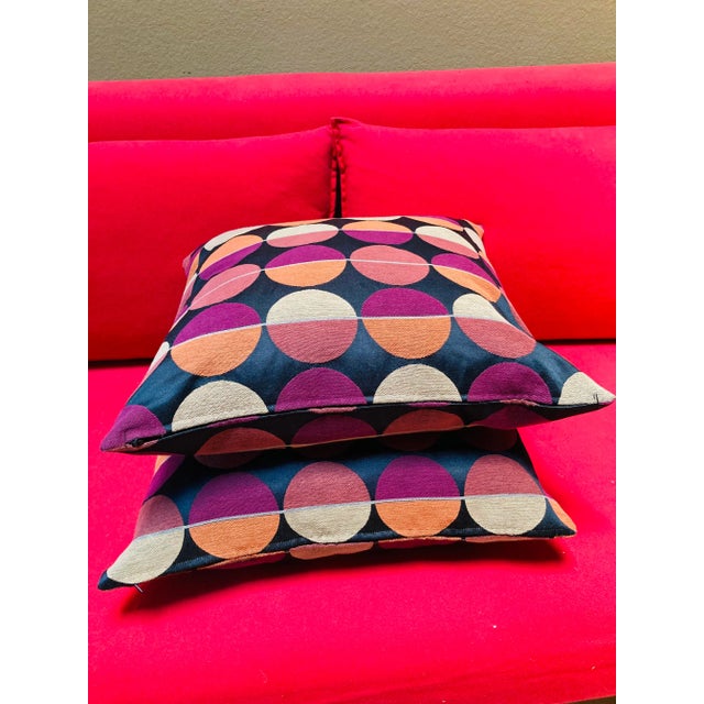 Fun black with multi color polka dot pillow they are cotton/polyester 18x18 size.