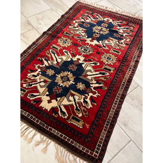 All rugs have been professionally cleaned; original condition is not altered, age-related wear is considered normal in...