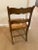 Wood and caned seat occasional chair with curved back and seat front. In great condition.