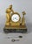 Allegory of Knowledge Clock French Empire period, circa 1800 Gilt bronze, mercury-polished with agate Rests on a sea-green...