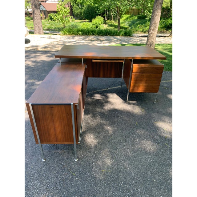 You are viewing a fantastic Walnut + Aluminum Executive Desk, designed by Hugh Acton c1950s. This classic mid century...