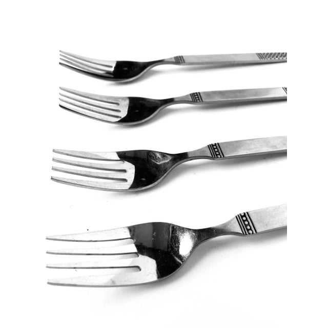 Vintage set of 4 Celtic Pattern Danika by MSI Japan stainless steel dinner forks 7.5"L , in good condition.